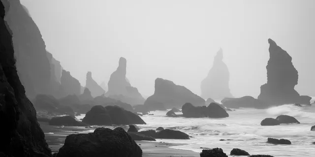 Hinterlands wallpaper: sea stacks mist
